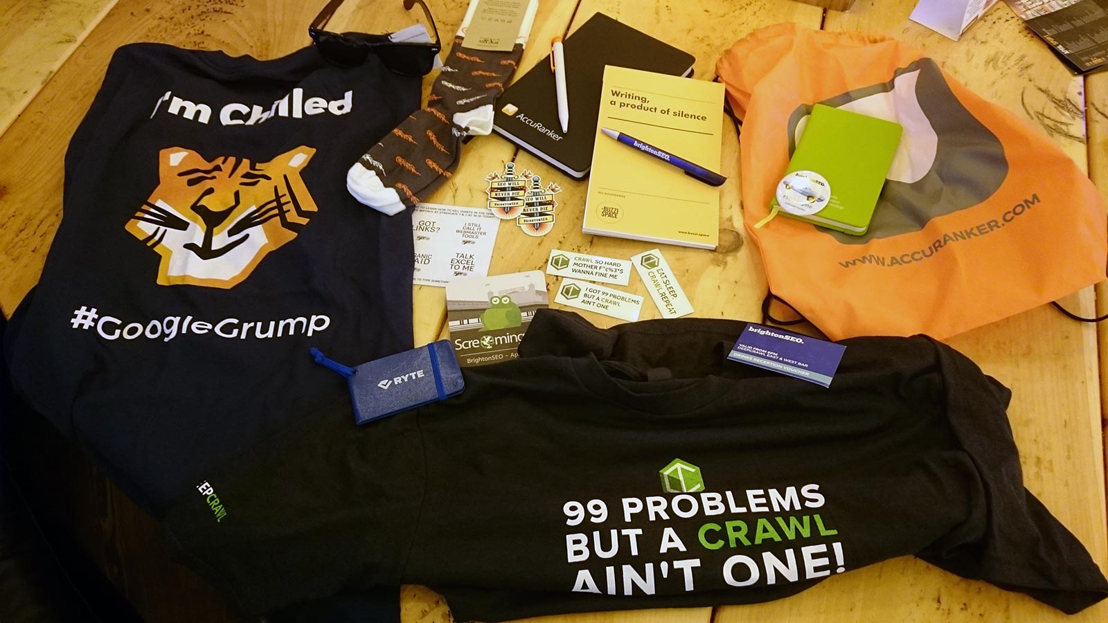 T-shirts and promo marketing materials from #brightonSEO conference 2018